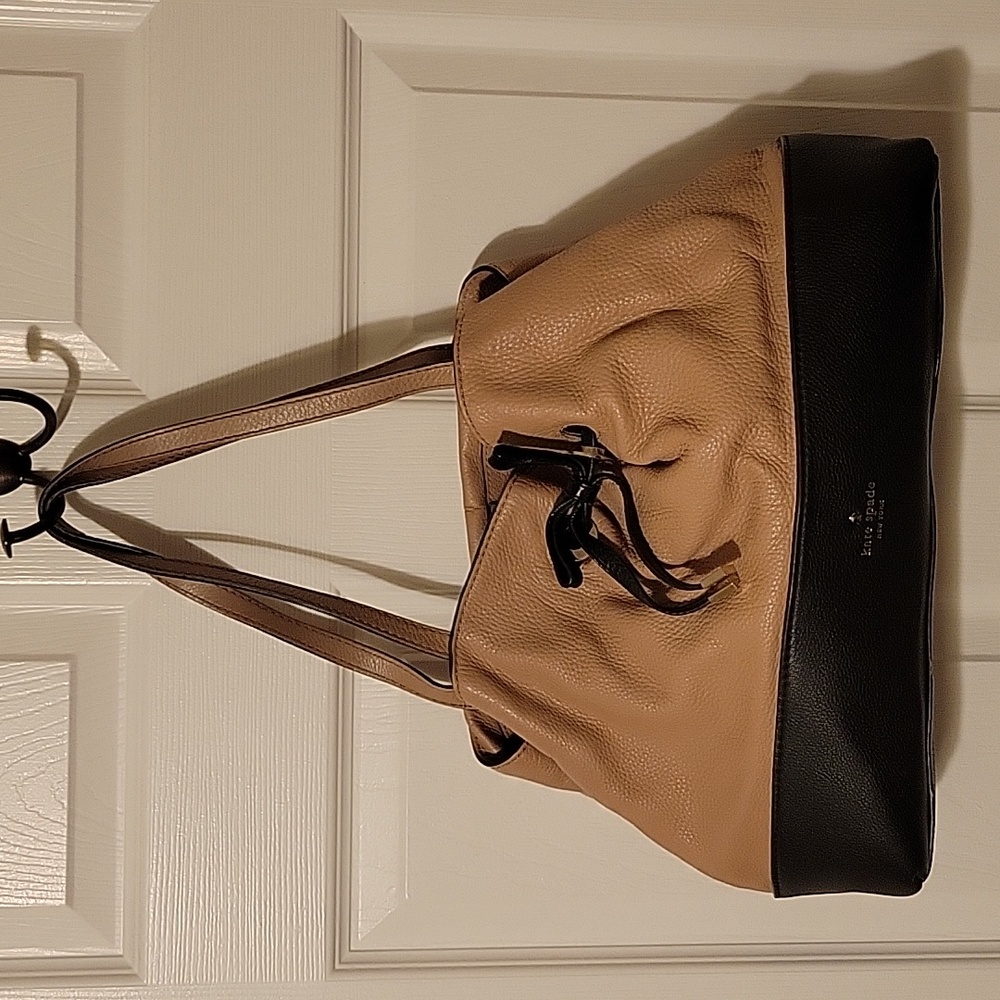 Kate Spade tan and black shoulder bag.